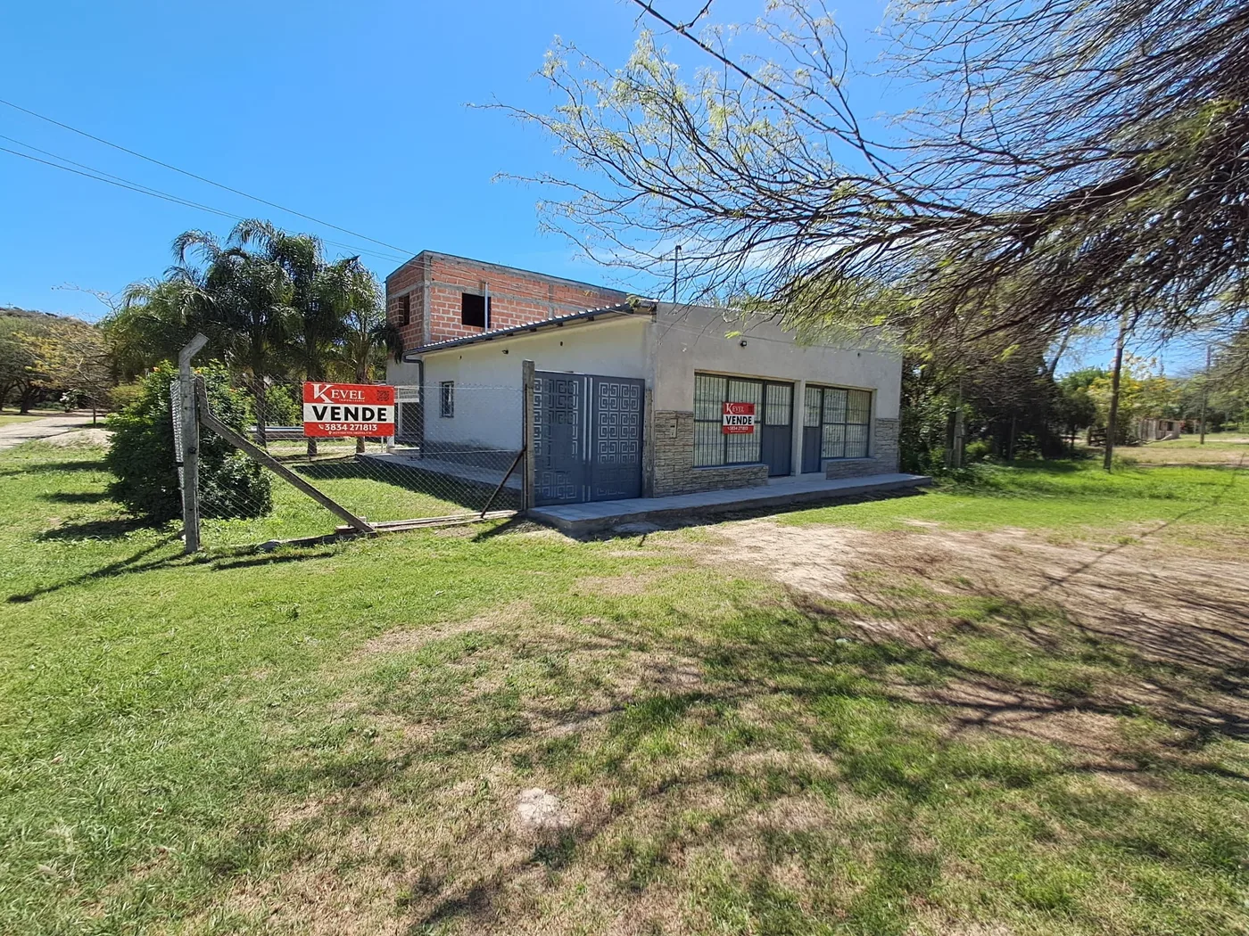 2 locales sobre ruta 1 con pileta y quincho, lista para escriturar