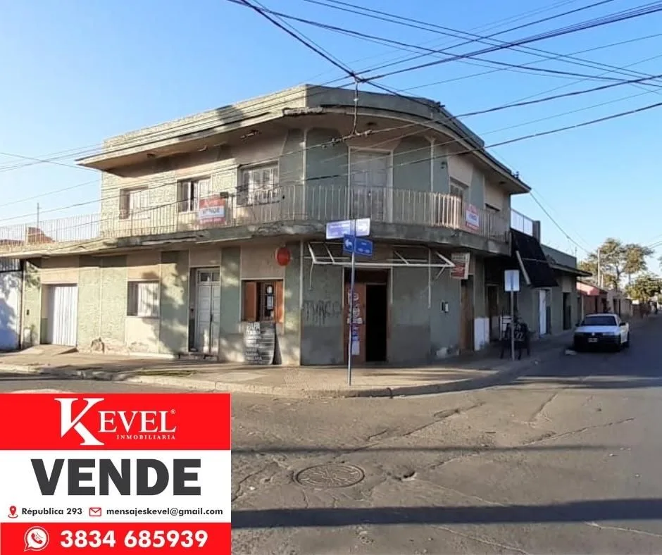 Esquina con locales comerciales y cada de 4 dormitorios, foto 1